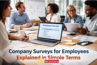 Employees reviewing an anonymous company survey together in a modern office setting